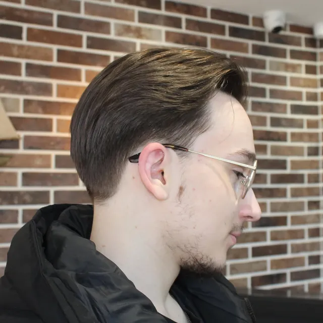 Slicked-back restyle with a taper